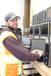 employee typing on computer