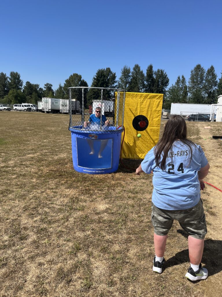 Garten CEO, Will Posegate, getting dunked in the dunk tank. 