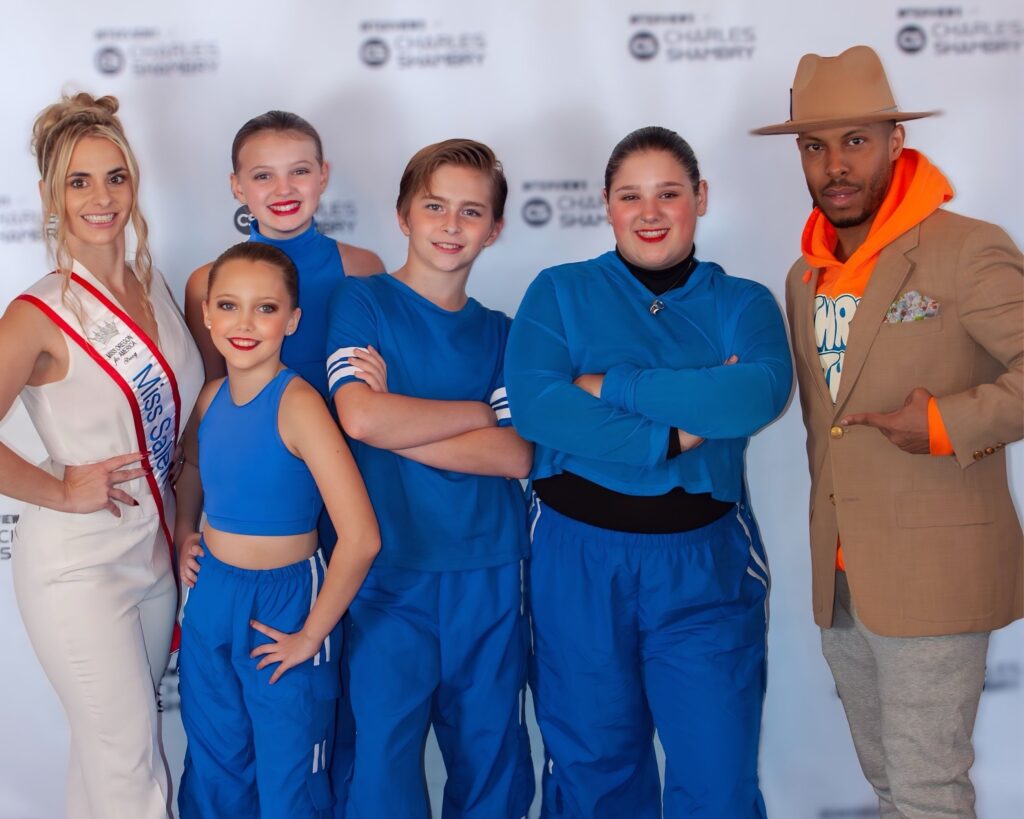 Miss salem and Charles Shambry pose with Salem's Got Talent Contestants. 