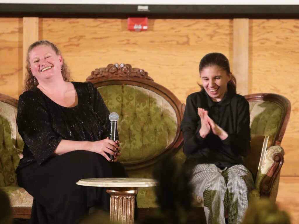 Olivia and her mom speaking at the Garten Gala 2025. 
