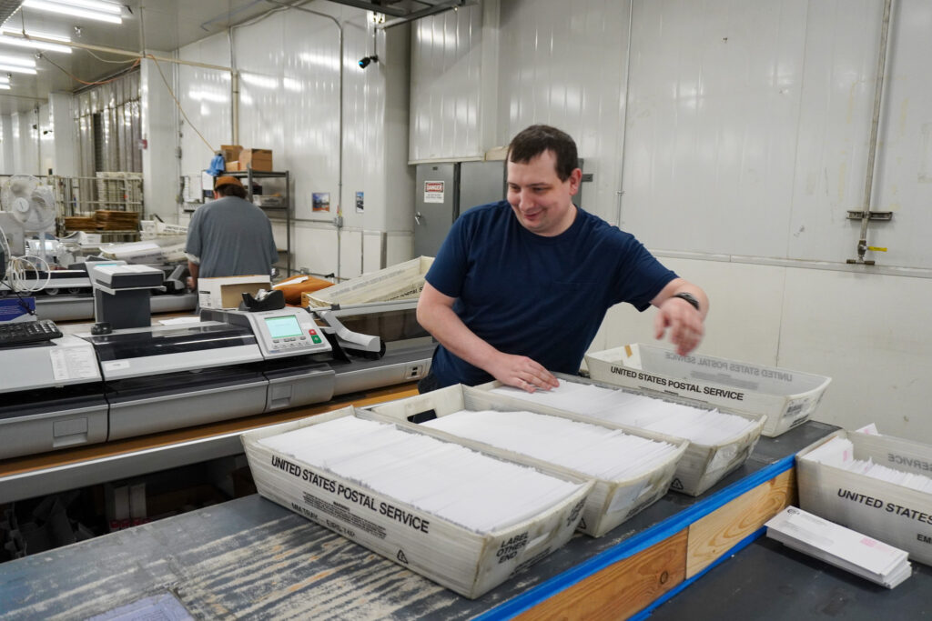 Employee with autism working in an inclusive workplace at Garten, representing autism acceptance in action.